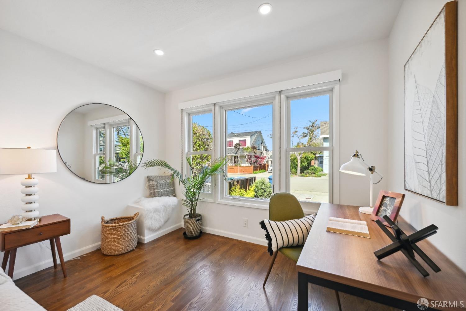 1208 Peach Street Alameda, CA 94501 - Photo 20 of 31 a living room with furniture and a large window