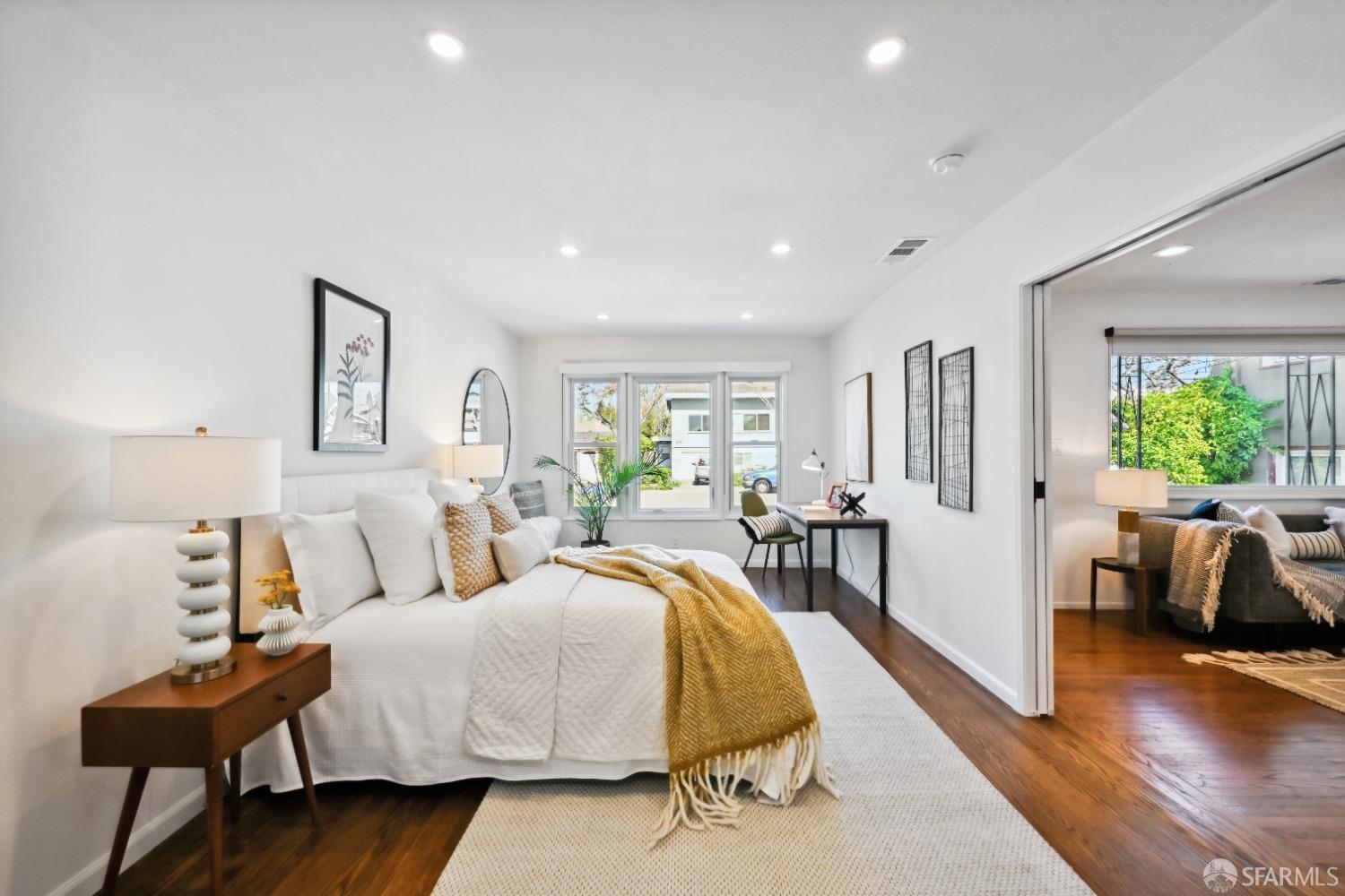 1208 Peach Street Alameda, CA 94501 - Photo 21 of 31 a bed room with a bed and a couch