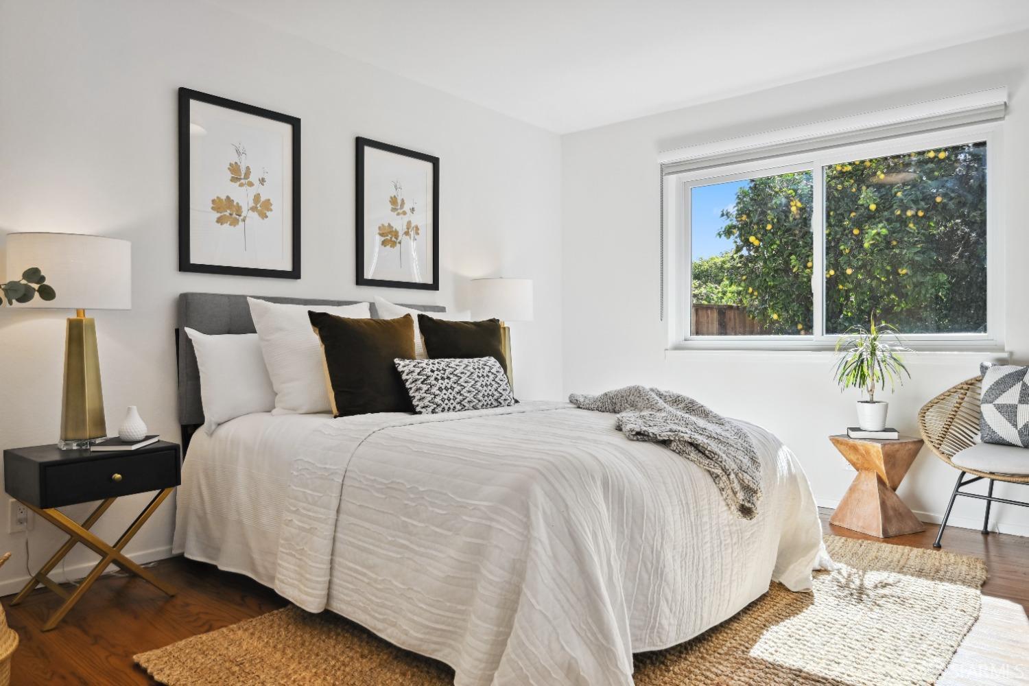 1208 Peach Street Alameda, CA 94501 - Photo 24 of 31 a bedroom with a bed painting on wall and a large window