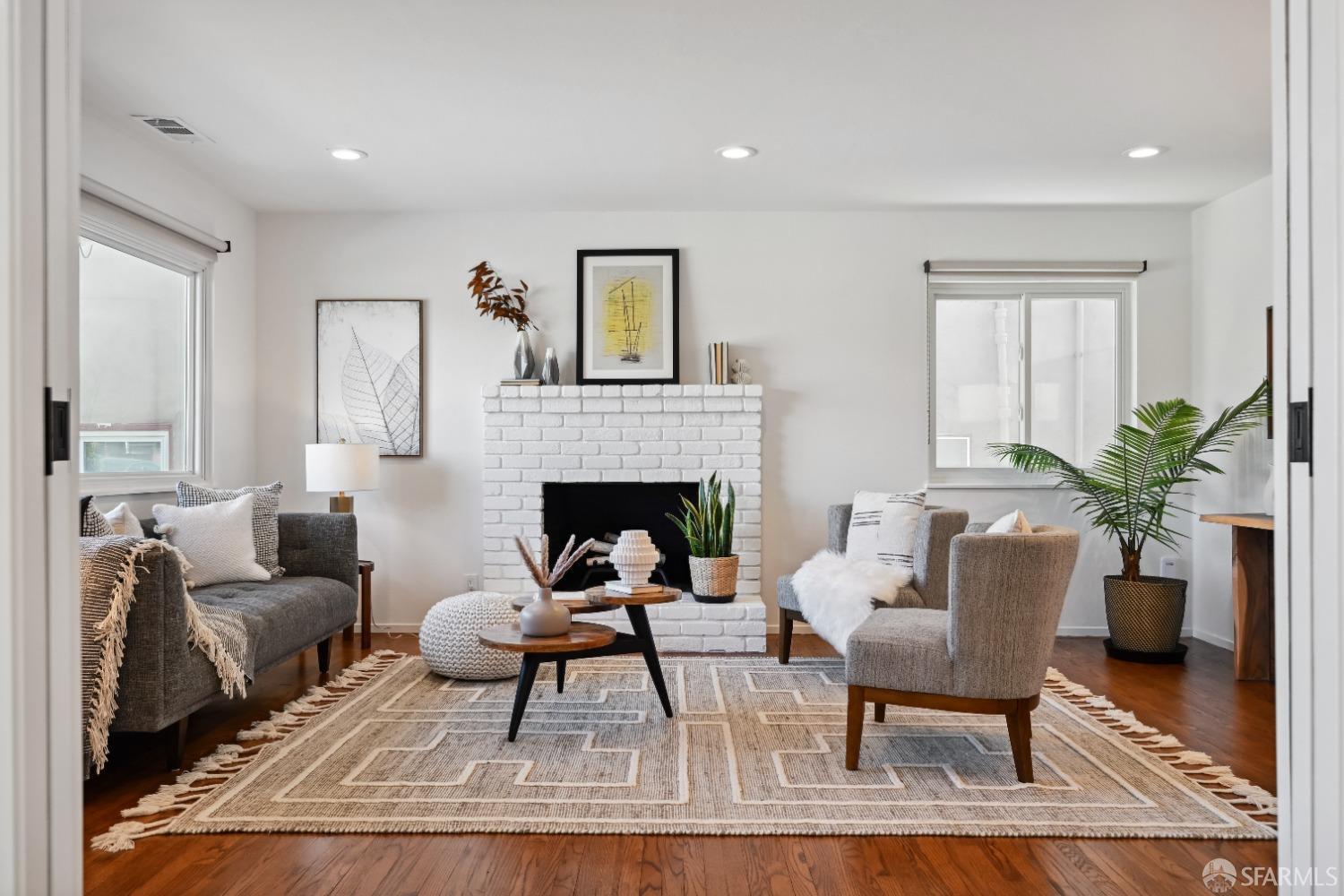 1208 Peach Street Alameda, CA 94501 - Photo 6 of 31 a living room with furniture and a fireplace