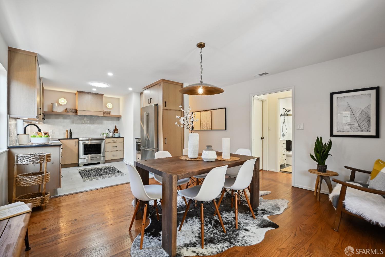 1208 Peach Street Alameda, CA 94501 - Photo 9 of 31 a view of a dining room with furniture window and wooden floor
