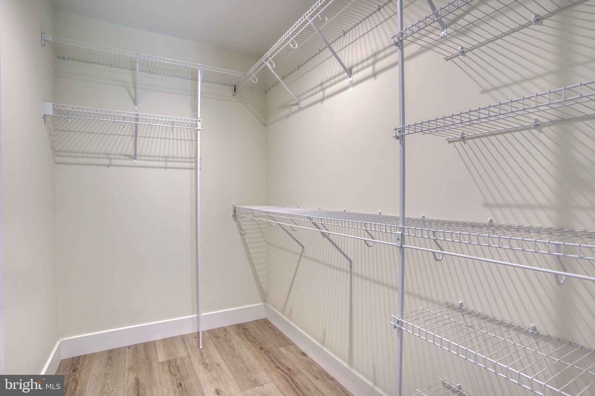 207 Charles Way Georgetown, DE 19947 - Photo 14 of 31 a view of a room with racks on the wall
