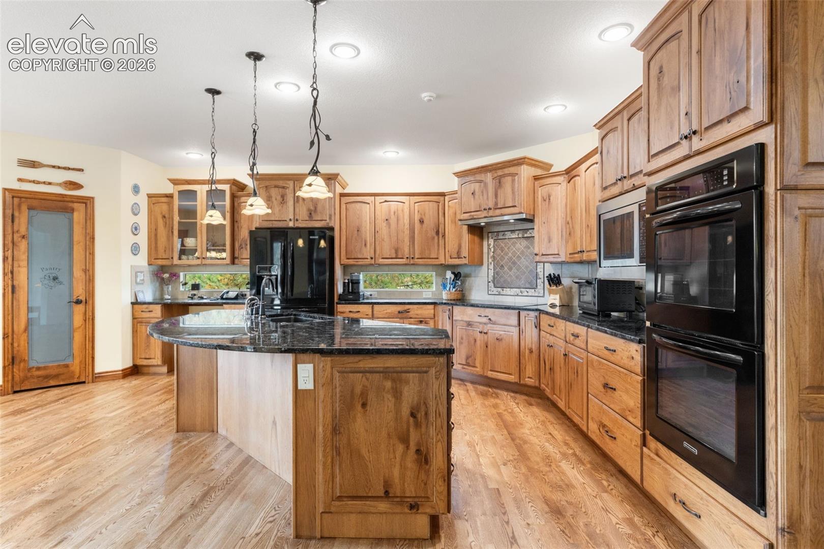 11685 Milford Road Elbert, CO 80106 - Photo 11 of 47 Kitchen and view of pantry