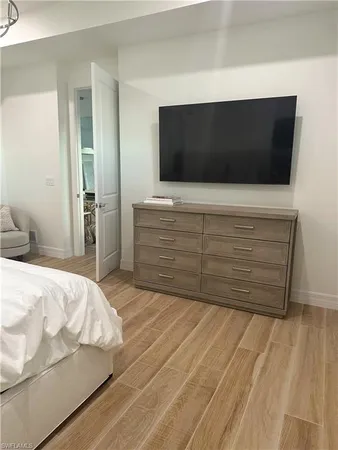 a living room with a flat screen tv