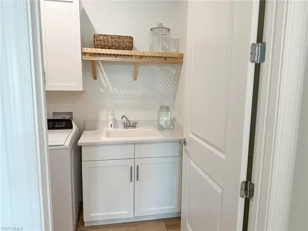 a utility room with a sink