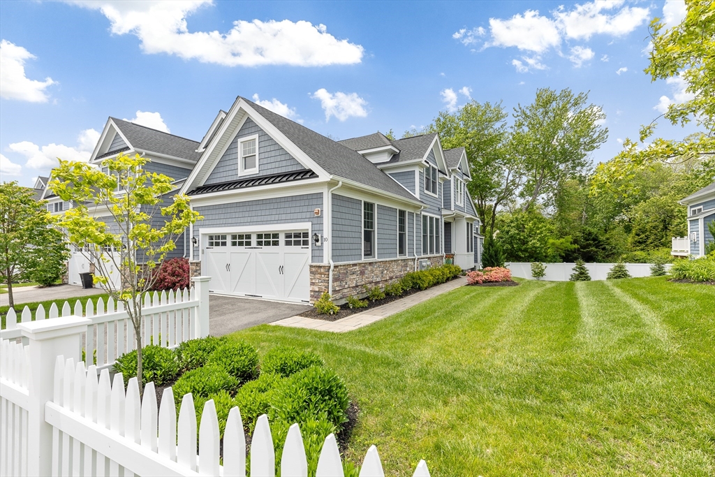 a house with swimming pool in front of it