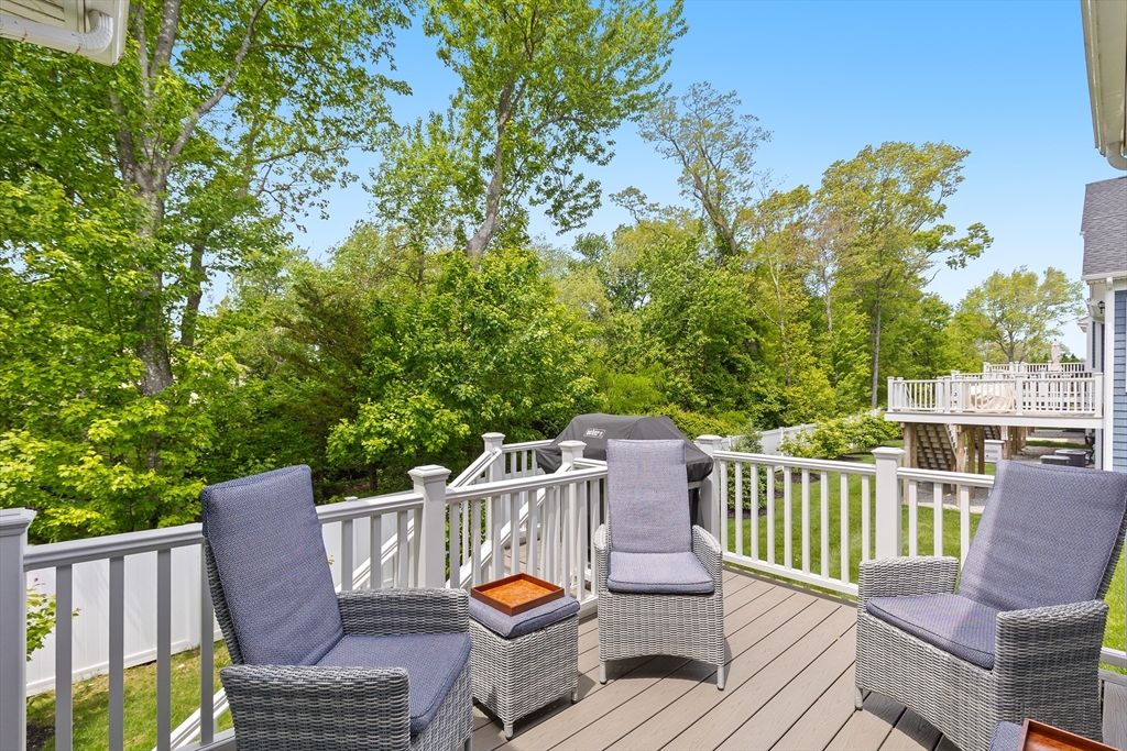 10 Benjamin Lane, Unit 10 Scituate, MA 02066 - Photo 15 of 42 a view of a deck with a chair