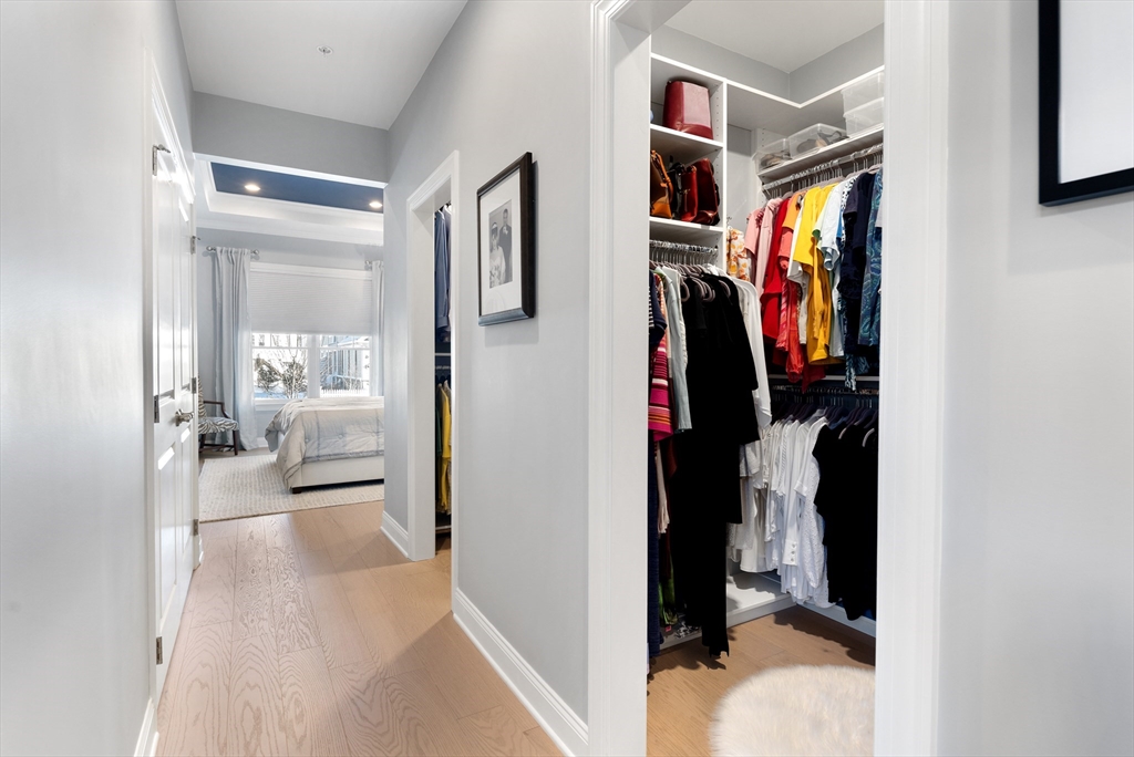10 Benjamin Lane, Unit 10 Scituate, MA 02066 - Photo 18 of 42 a view of walk in closet with clothes and shoes