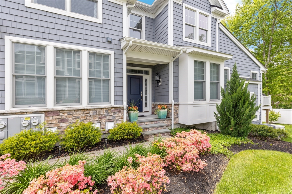 10 Benjamin Lane, Unit 10 Scituate, MA 02066 - Photo 2 of 42 front view of a house