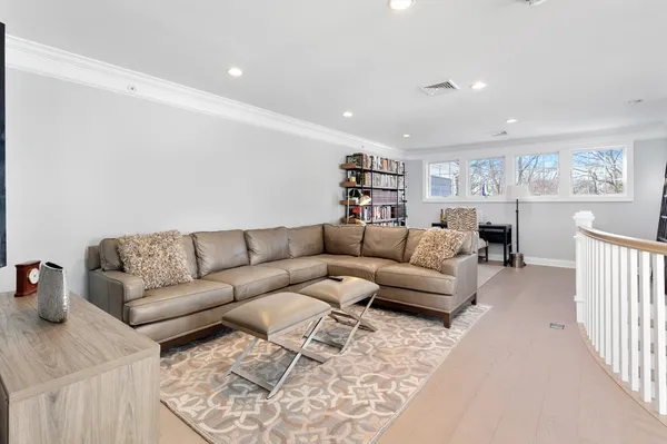 a living room with furniture and a couch