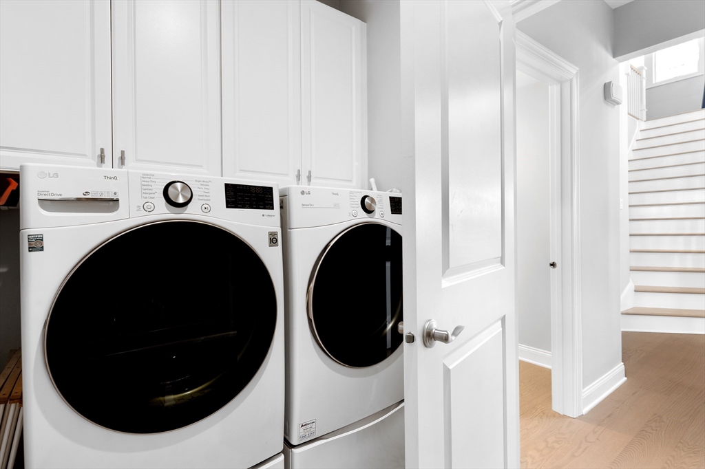 10 Benjamin Lane, Unit 10 Scituate, MA 02066 - Photo 28 of 42 a view of a kitchen with washer and dryer