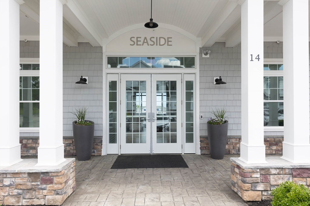 10 Benjamin Lane, Unit 10 Scituate, MA 02066 - Photo 33 of 42 a front view of a building with windows