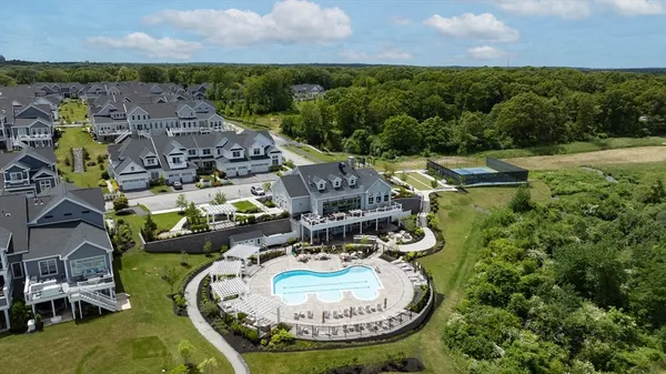 an aerial view of a house with outdoor space