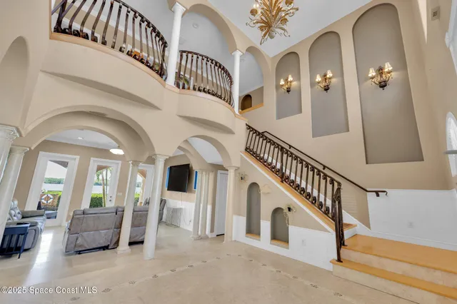 a living room with fireplace furniture and a fireplace