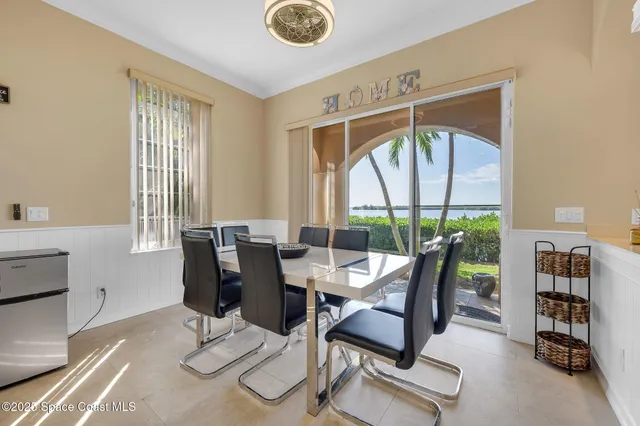 a utility room with sink dryer and washer