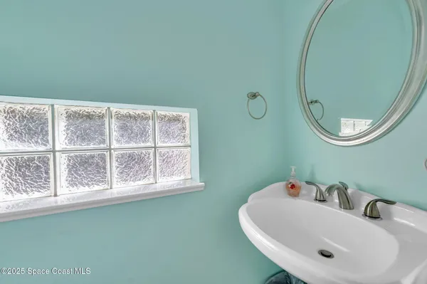 a view of a bathroom with a window