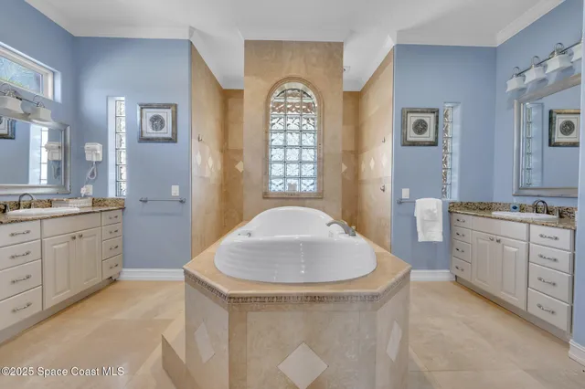 a bedroom with double bed and a flat screen tv