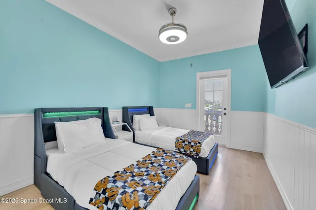 a bath tub sitting in a bathroom next to a window