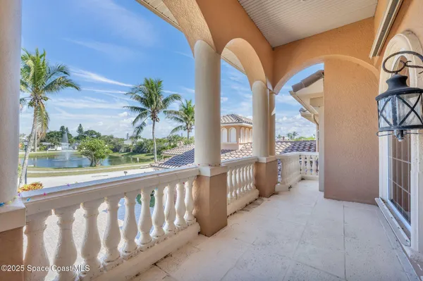 a view of a garden from a balcony