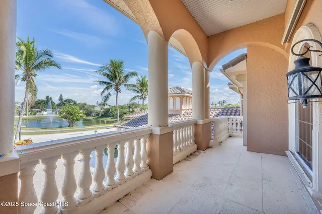 a view of a garden from a balcony
