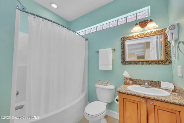 a view of balcony with wooden floor