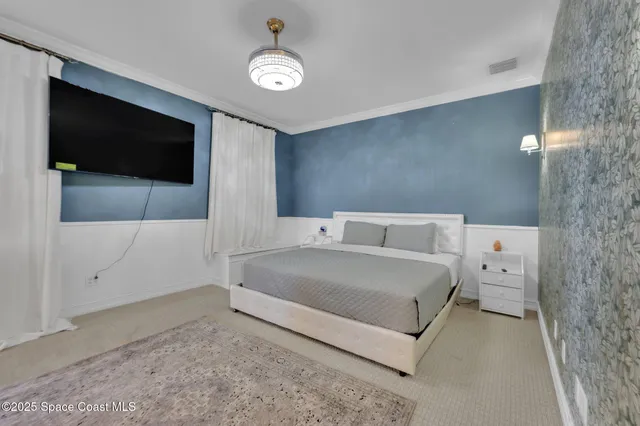 an aerial view of a house with outdoor space lake view and sitting space