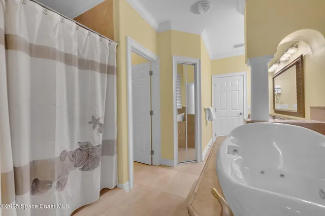 a view of a house with backyard porch and sitting area