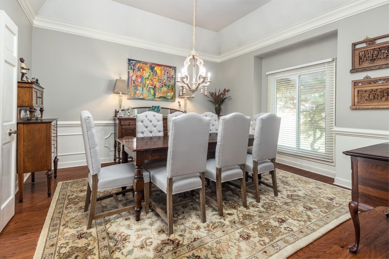 8347 Bazemore Road Memphis, TN 38018 - Photo 6 of 25 a dining room with furniture a rug a rug and a window