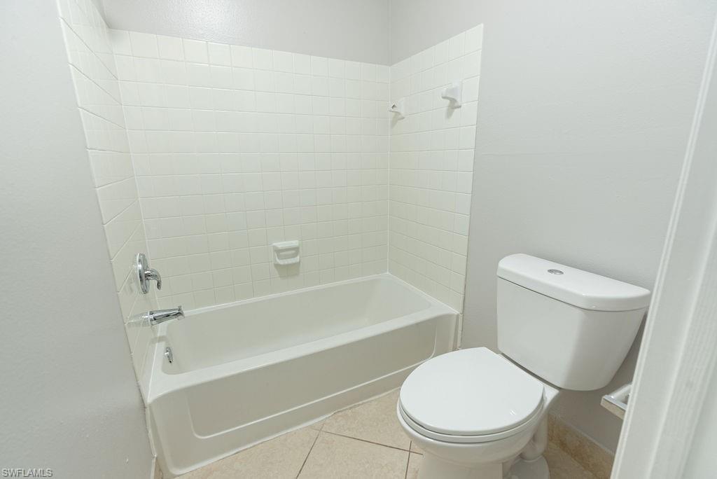 2045 Rookery Bay Drive, Unit 1901 Naples, FL 34114 - Photo 12 of 18 Full bath featuring tile patterned floors and shower / tub combination