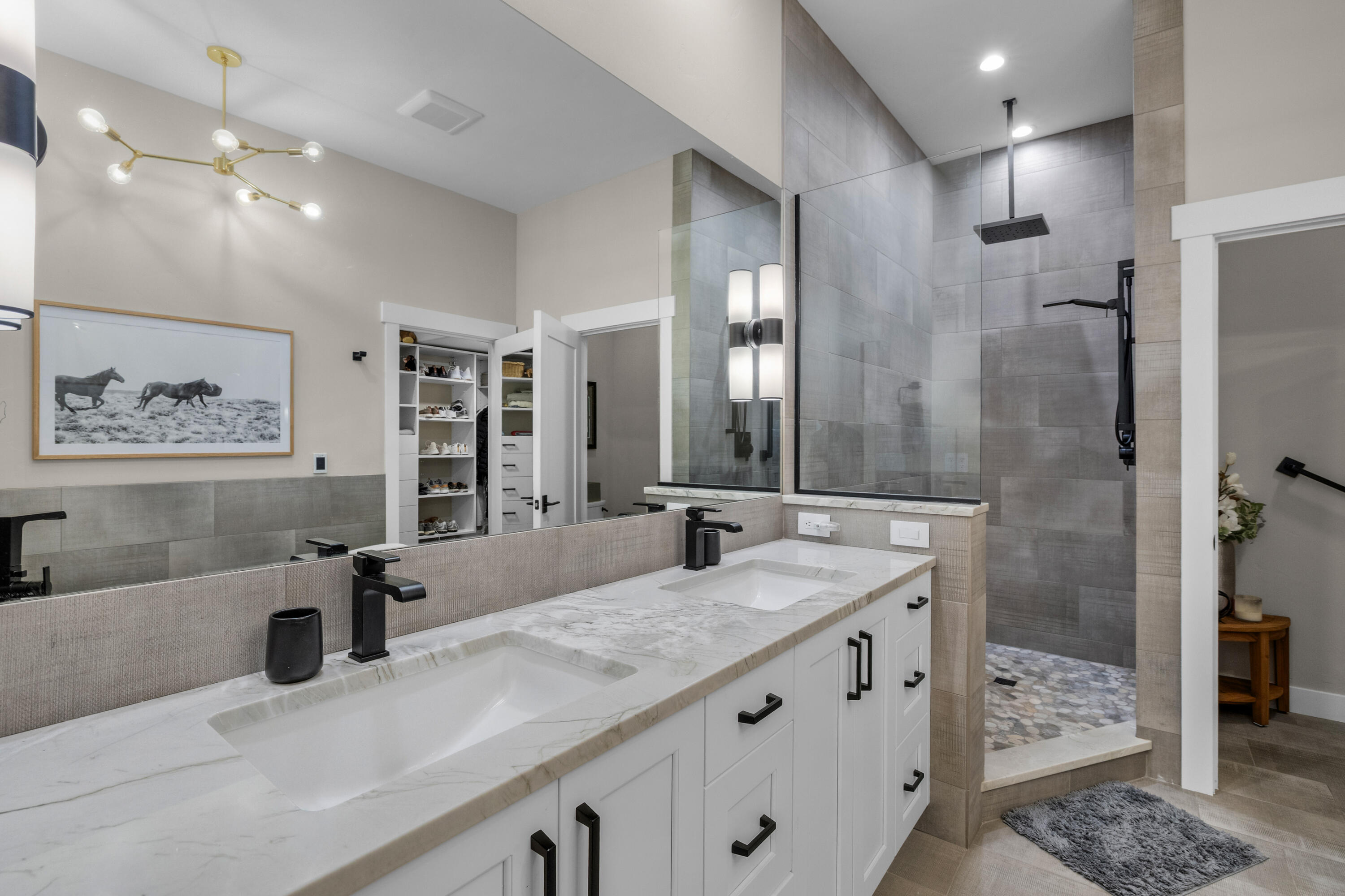 19460 Chip Shot Lane Bend, OR 97702 - Photo 27 of 56 a bathroom with double vanity sink and a mirror