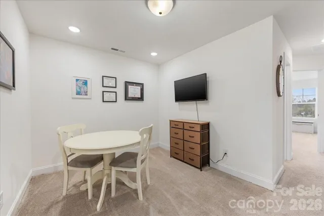 a view of a livingroom with furniture