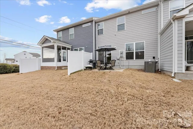 a front view of a house with yard