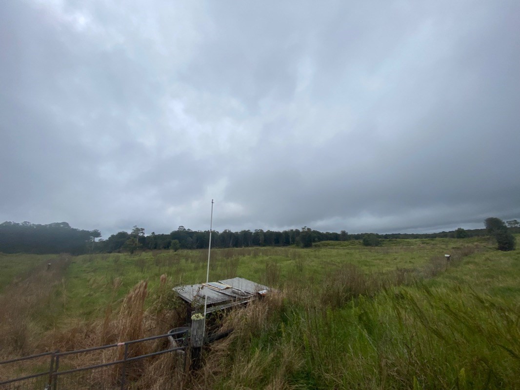 21 North A N Peck Road Mountain View, HI 96771 - Photo 4 of 7 a view of a lake with couches in the back