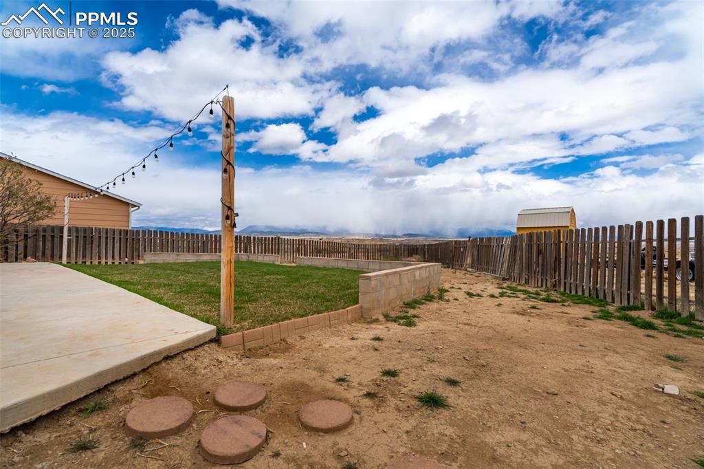 254 Indian Hills Road Florence, CO 81226 - Photo 19 of 22 a view of a backyard with sitting area