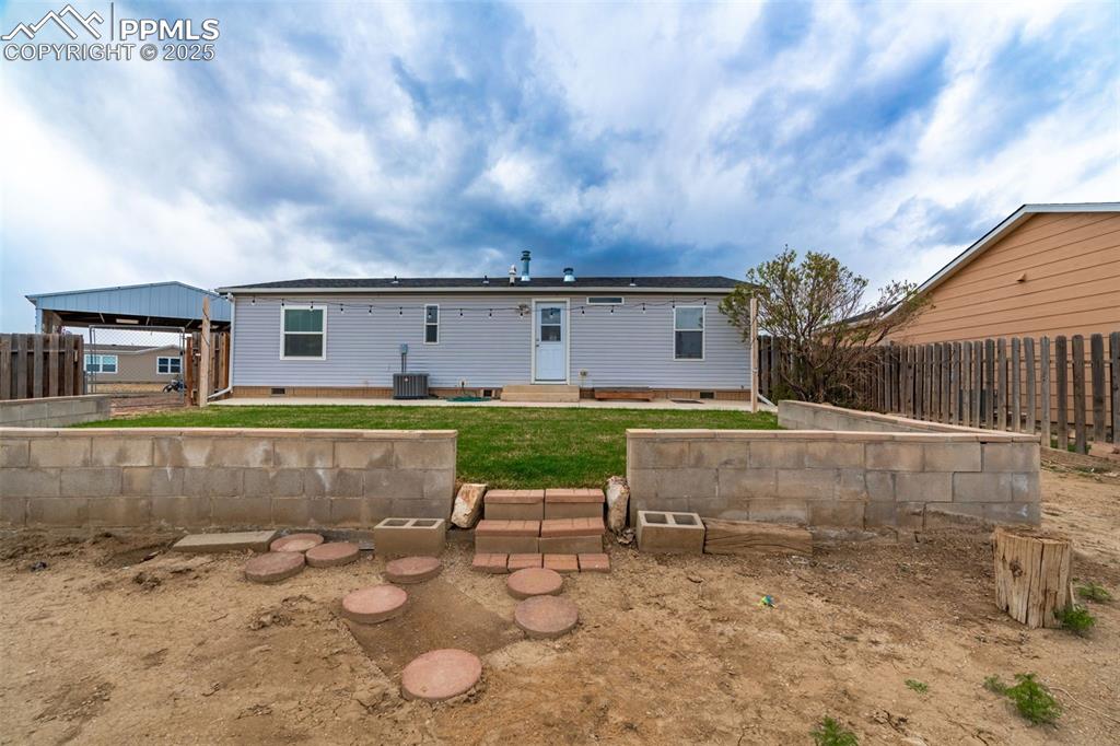254 Indian Hills Road Florence, CO 81226 - Photo 20 of 22 a view of a house with a yard