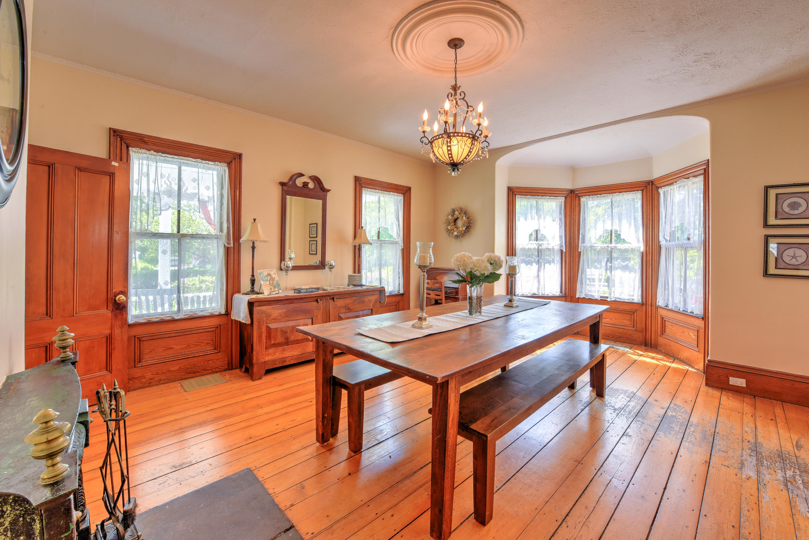 508 Main Street Centerville, MA 02632 - Photo 11 of 35 a view of a dining room with furniture window and wooden floor