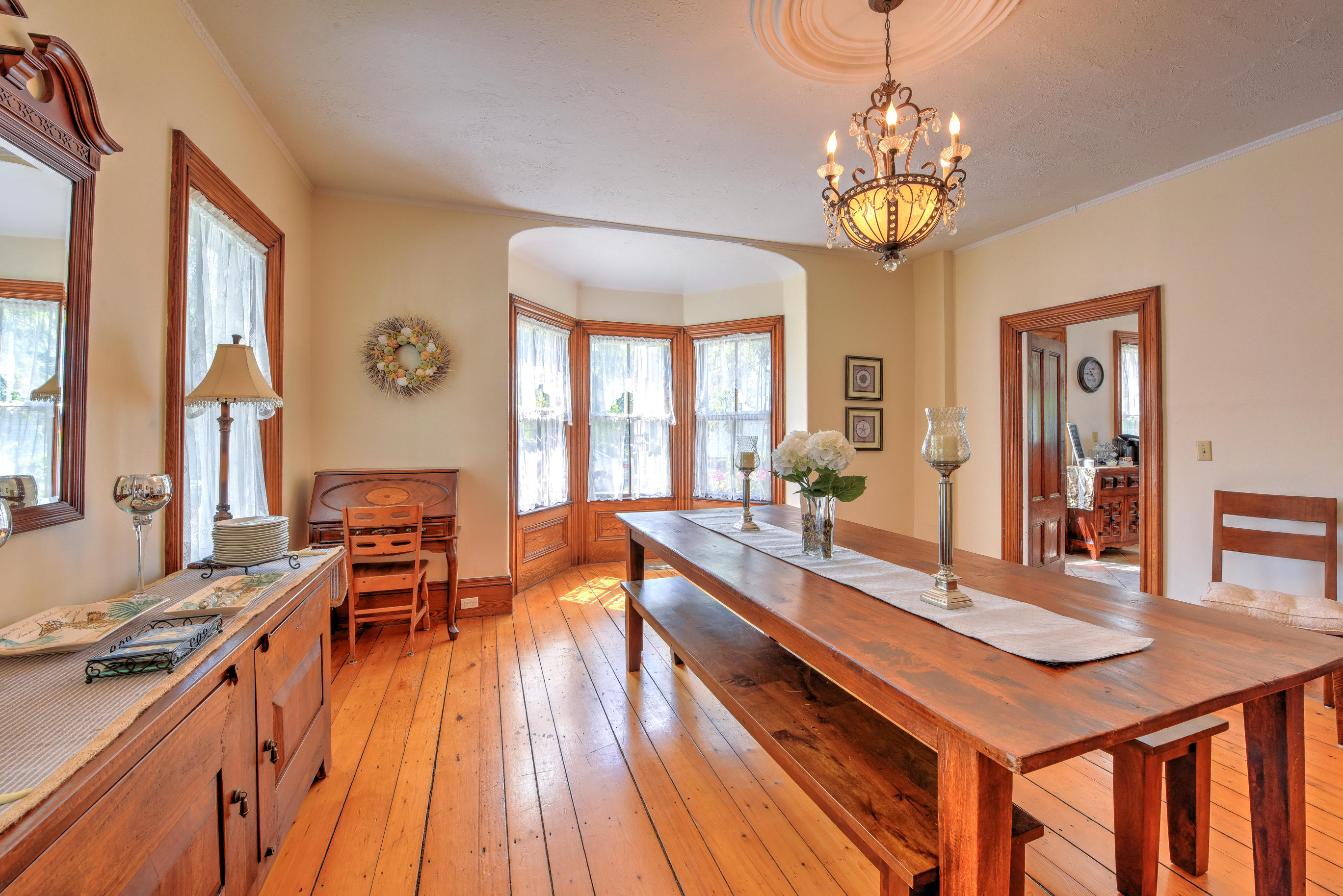 508 Main Street Centerville, MA 02632 - Photo 12 of 35 a large kitchen with a table and chairs