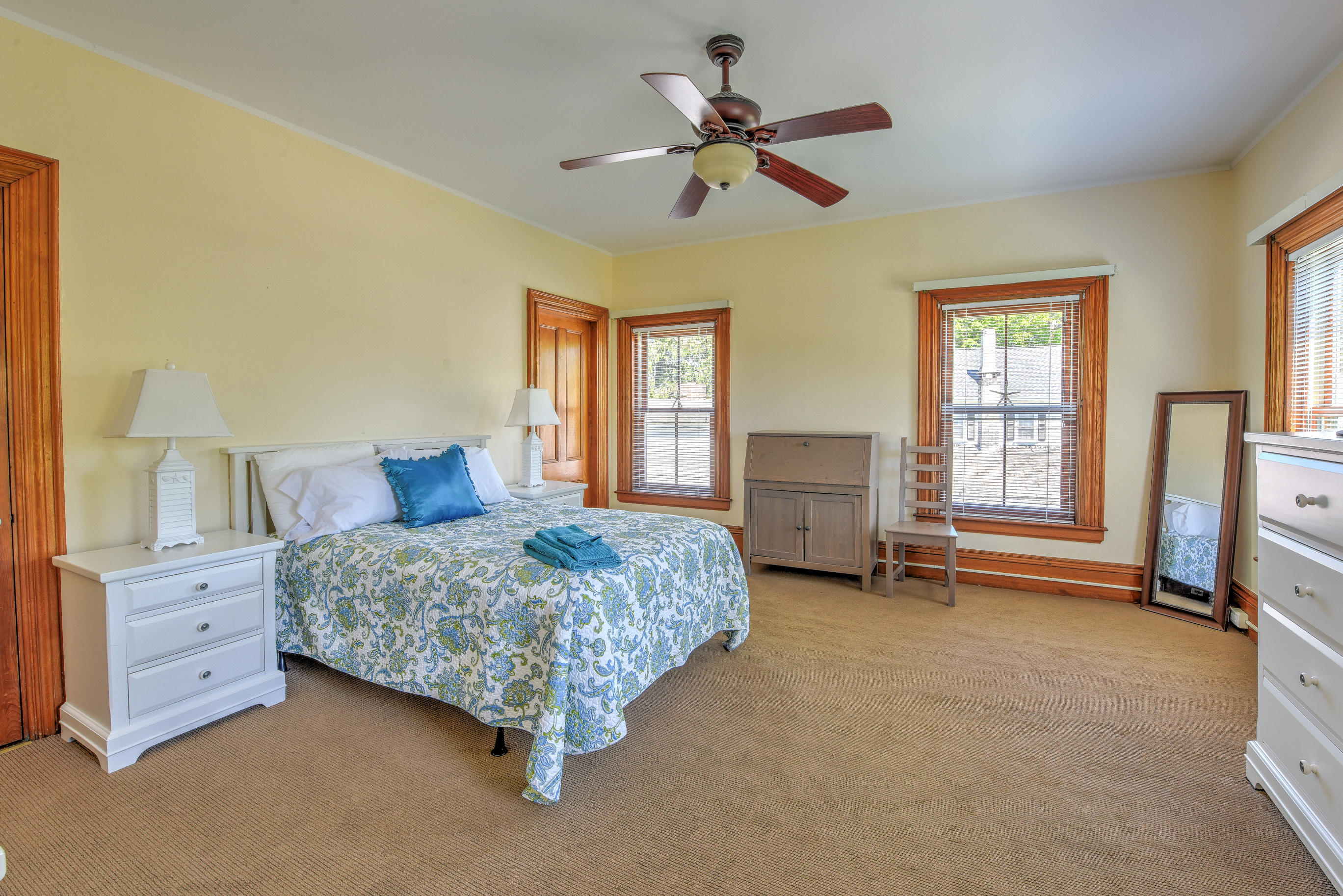 508 Main Street Centerville, MA 02632 - Photo 20 of 35 a spacious bedroom with a bed and a cabinets