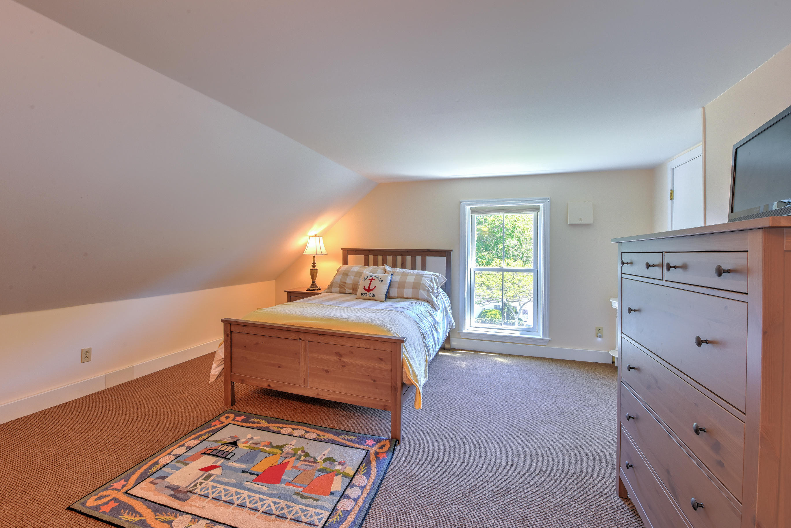 508 Main Street Centerville, MA 02632 - Photo 22 of 35 a bedroom with a bed and a window