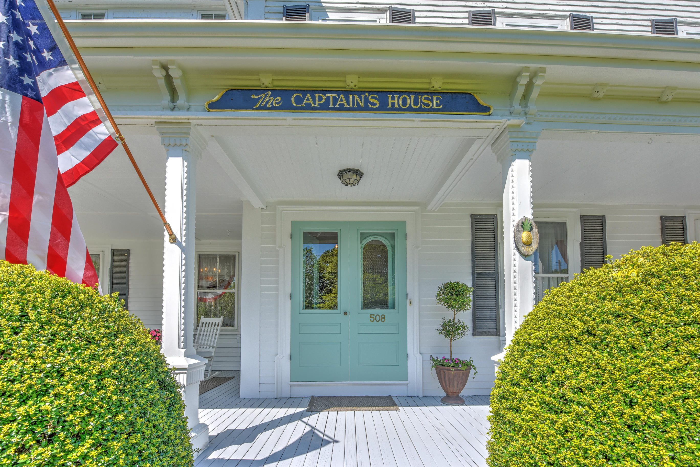 508 Main Street Centerville, MA 02632 - Photo 5 of 35 a front view of a house with a yard
