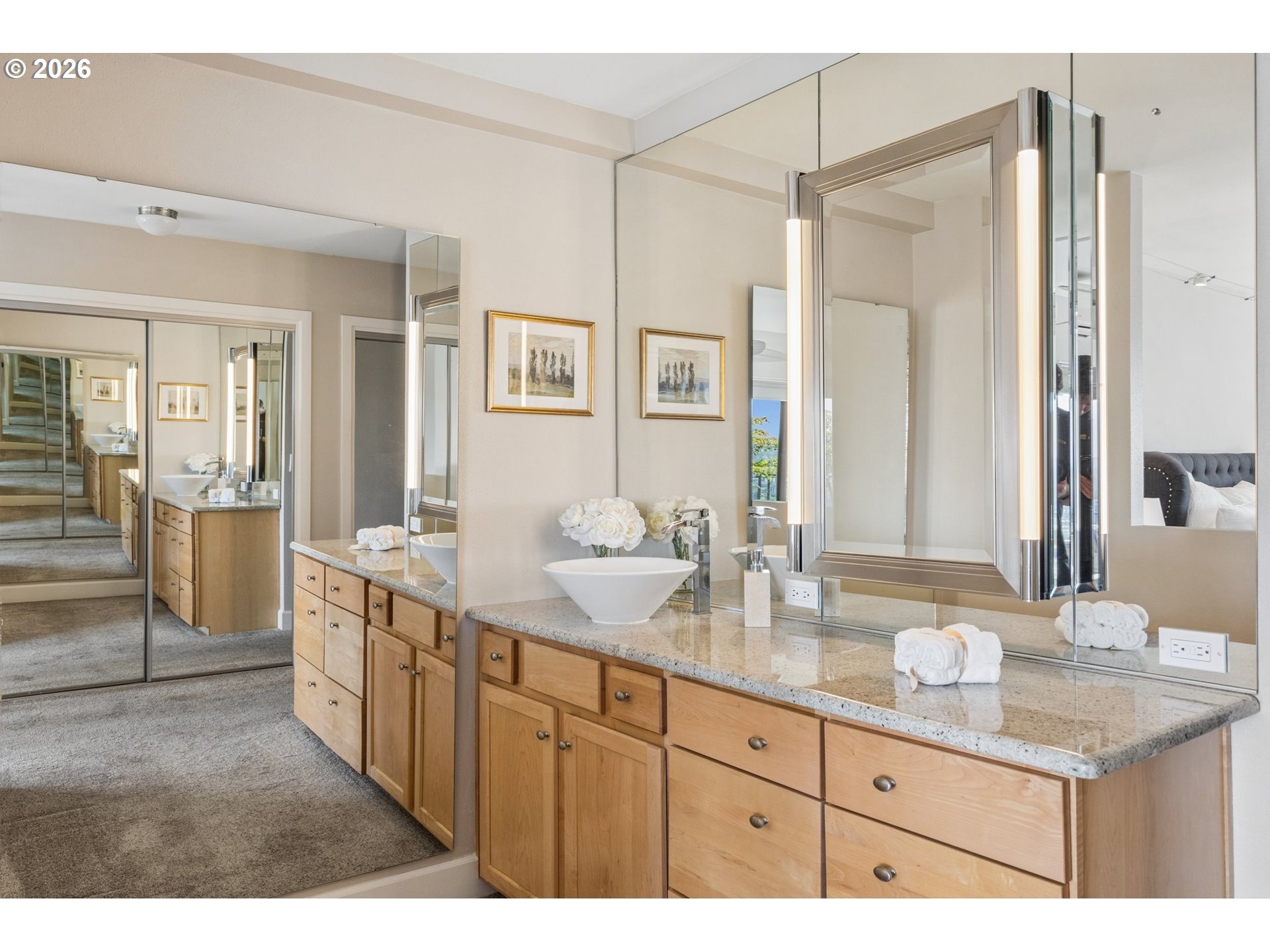 2211 Southwest 1st Avenue, Unit 1402 Portland, OR 97201 - Photo 35 of 48 a bathroom with a granite countertop sink mirror and double