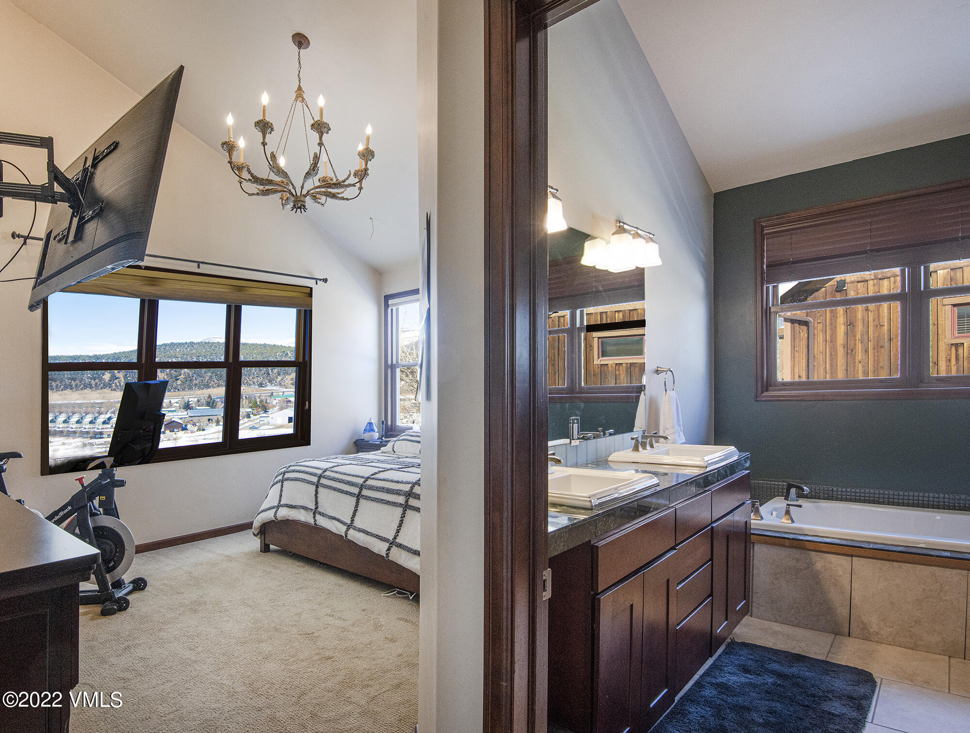 213 Bluffs Drive Eagle, CO 81631 - Photo 11 of 35 a view of hall way with furniture and chandelier