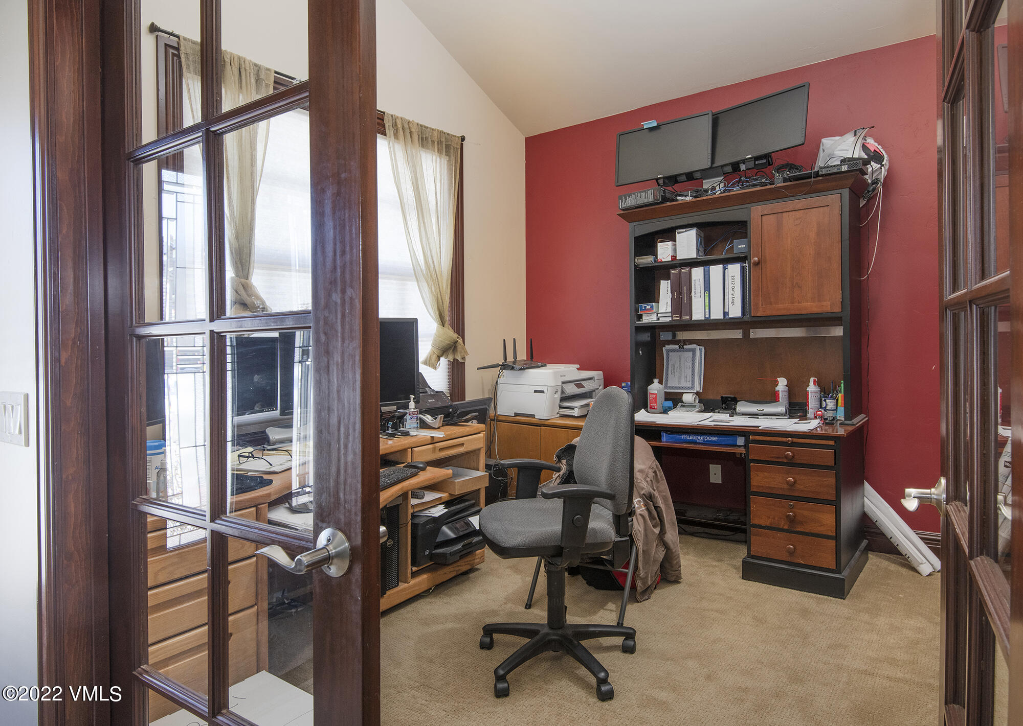 213 Bluffs Drive Eagle, CO 81631 - Photo 17 of 35 a view of a workspace with furniture and a window
