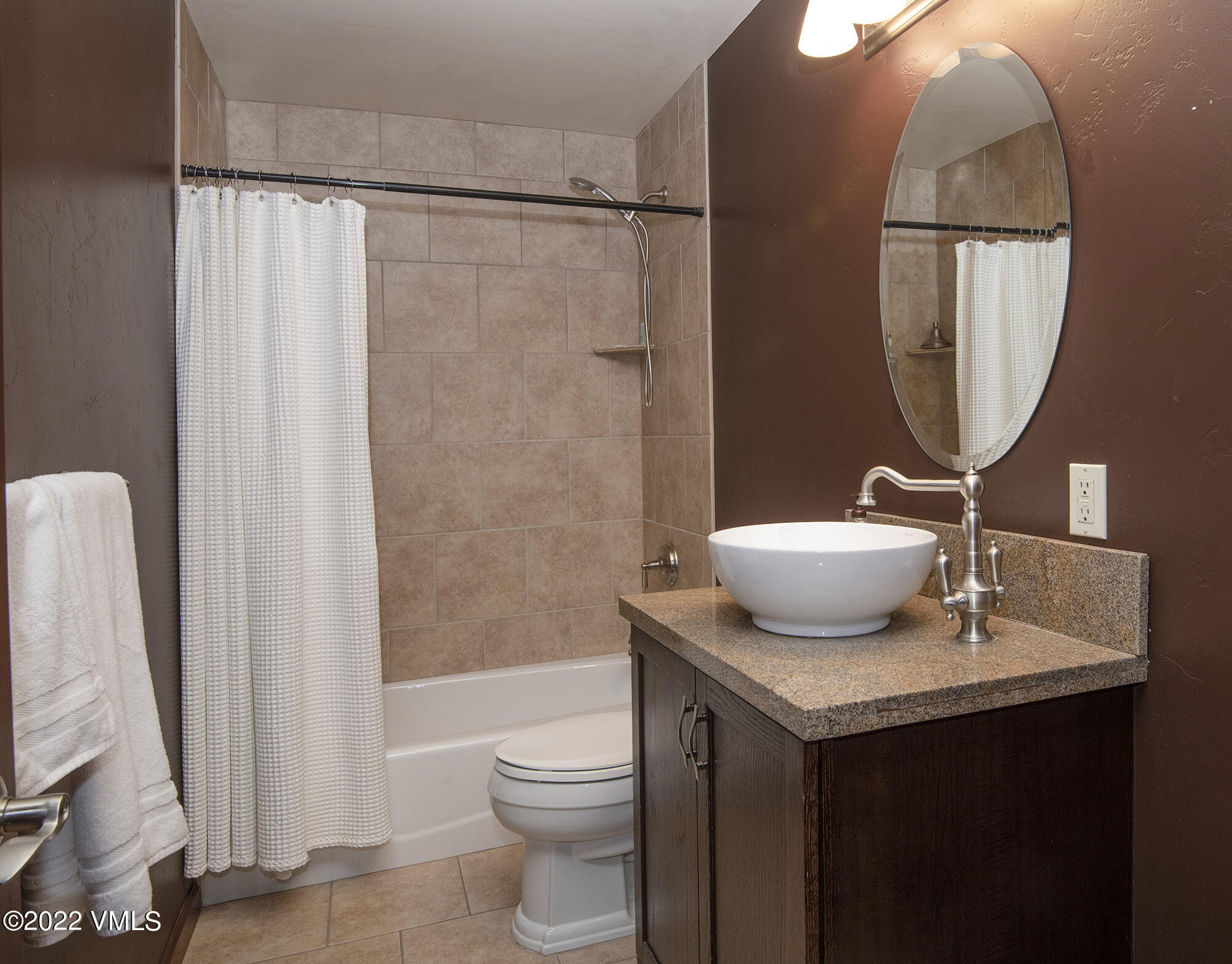 213 Bluffs Drive Eagle, CO 81631 - Photo 18 of 35 a bathroom with a sink toilet and shower