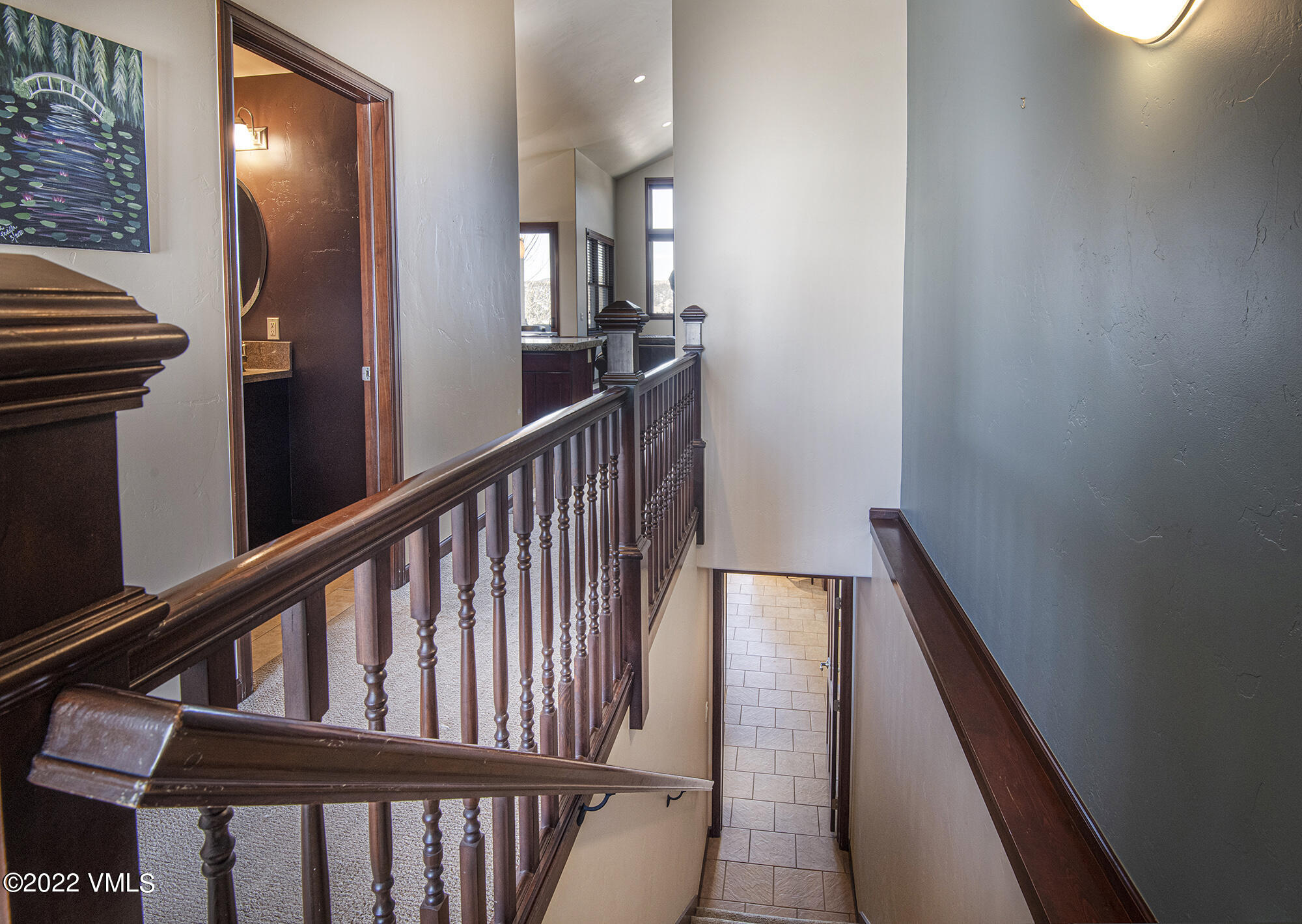 213 Bluffs Drive Eagle, CO 81631 - Photo 19 of 35 a view of staircase with railing and white walls