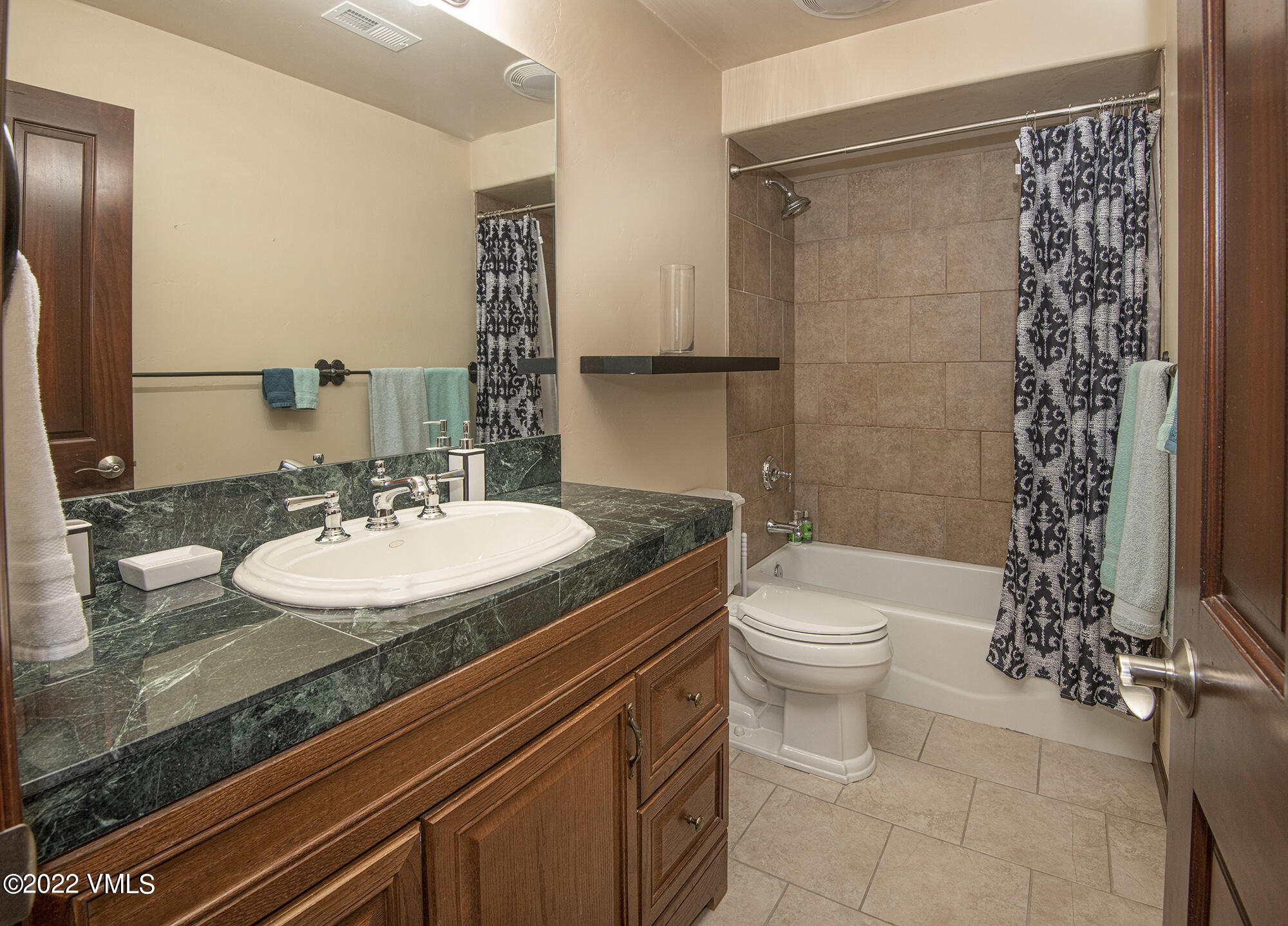 213 Bluffs Drive Eagle, CO 81631 - Photo 22 of 35 a bathroom with a sink a toilet and shower