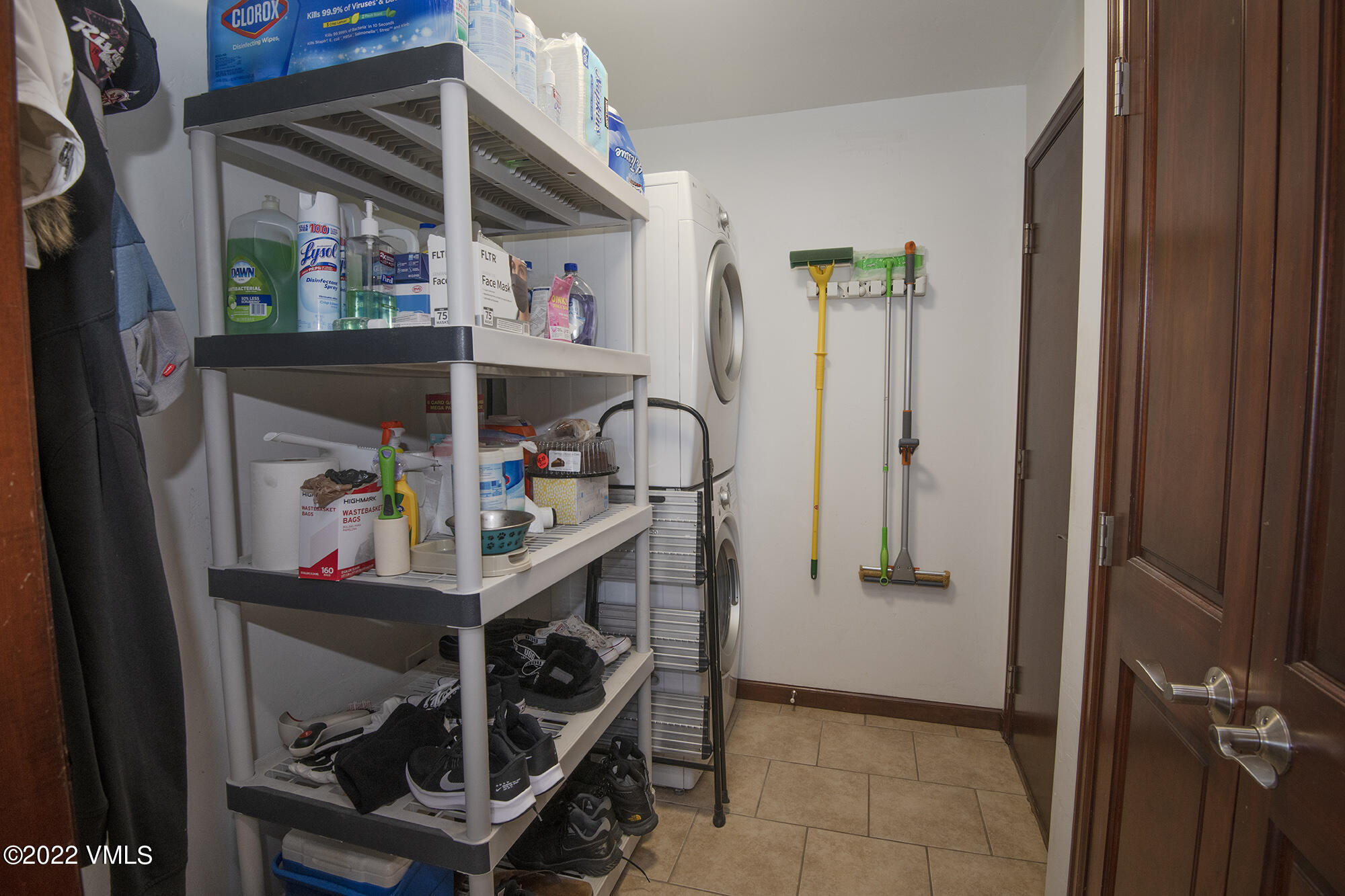 213 Bluffs Drive Eagle, CO 81631 - Photo 29 of 35 a view of a hallway with dining room and furniture