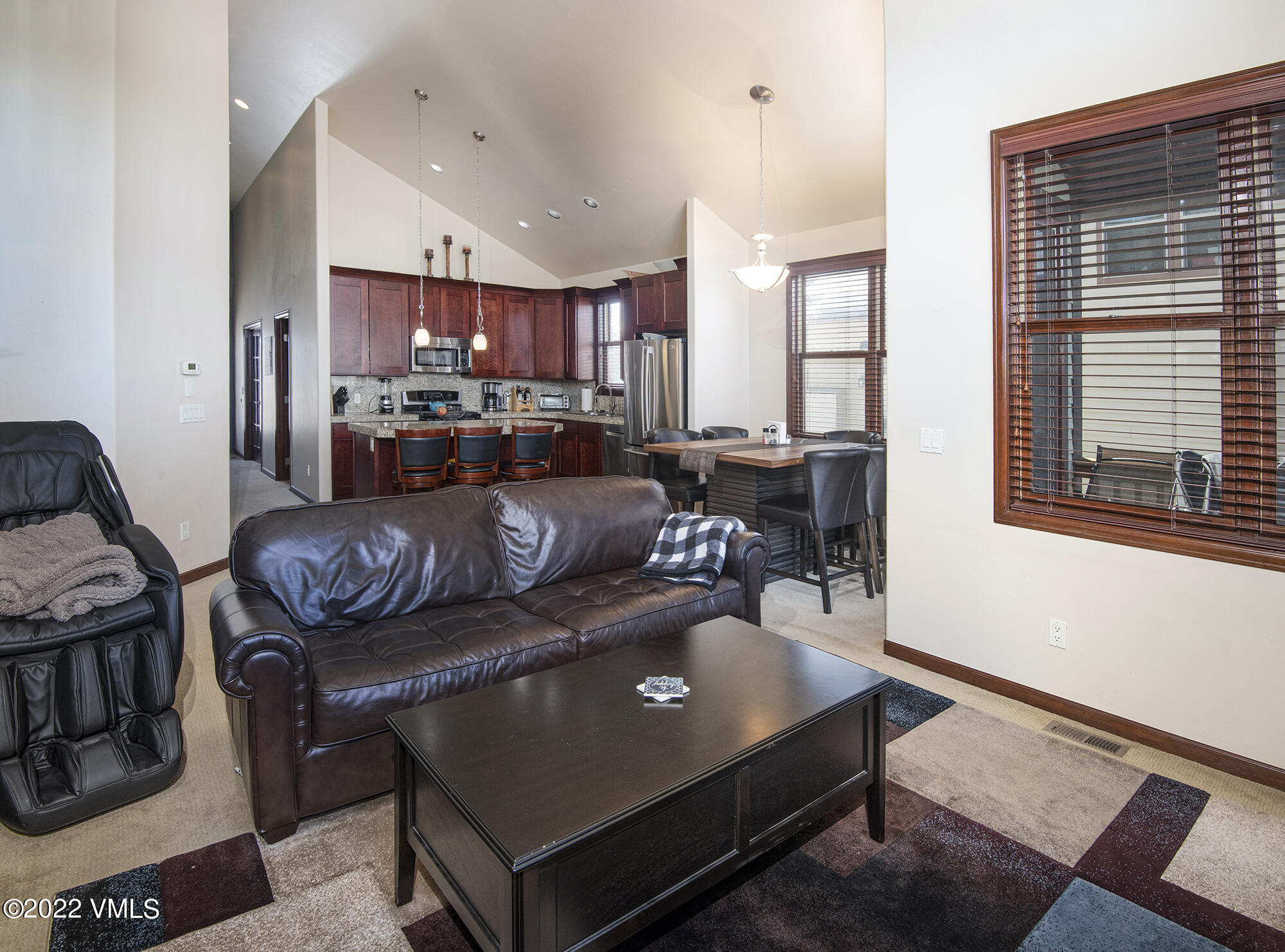 213 Bluffs Drive Eagle, CO 81631 - Photo 6 of 35 a living room with furniture