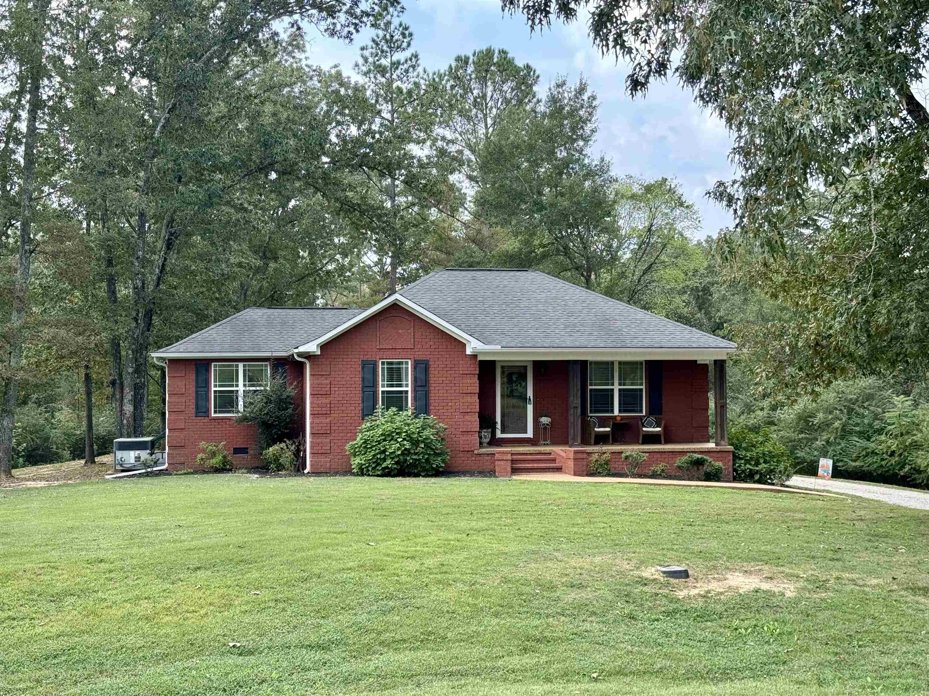 40 Foxtrot Road Adamsville, TN 38310 - Photo 35 of 39 Single story home with brick siding, crawl space, a front lawn, and covered porch