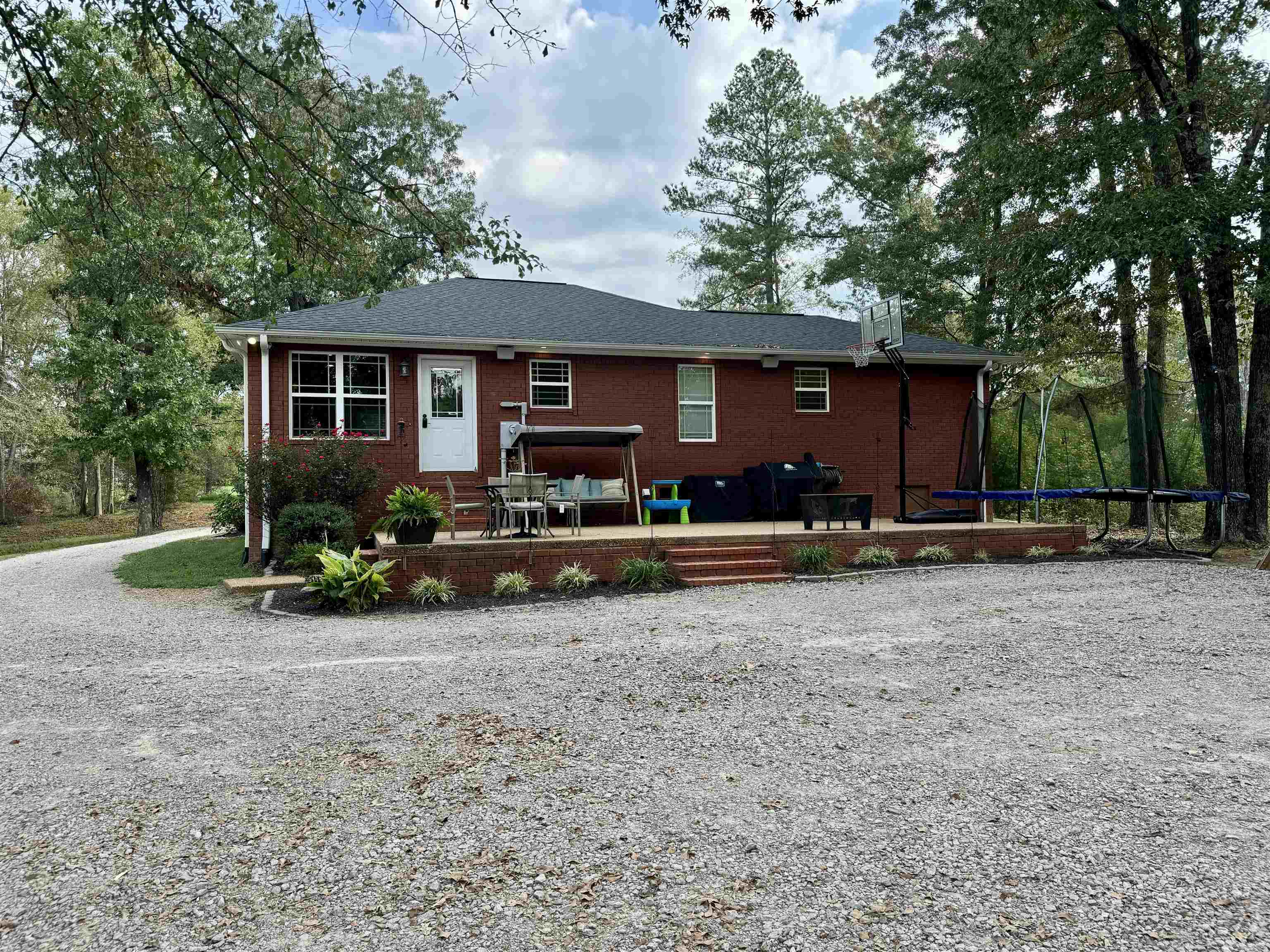 40 Foxtrot Road Adamsville, TN 38310 - Photo 4 of 39 Rear view of house with brick siding